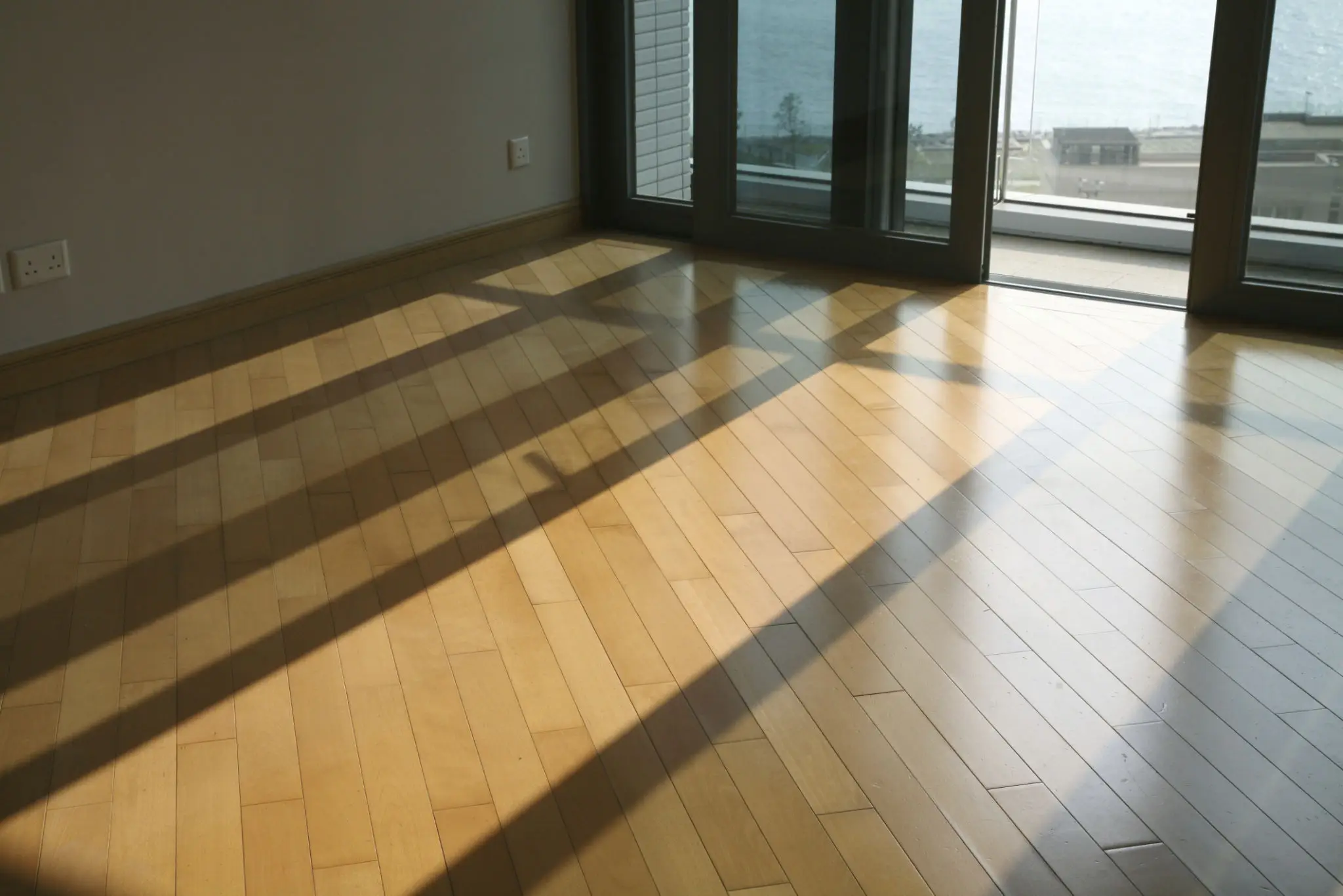 Sunlight casting long shadows indoors